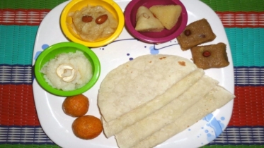 শবে বরাতে হালুয়া-রুটি বিতরণ করা কি নাজায়েজ?